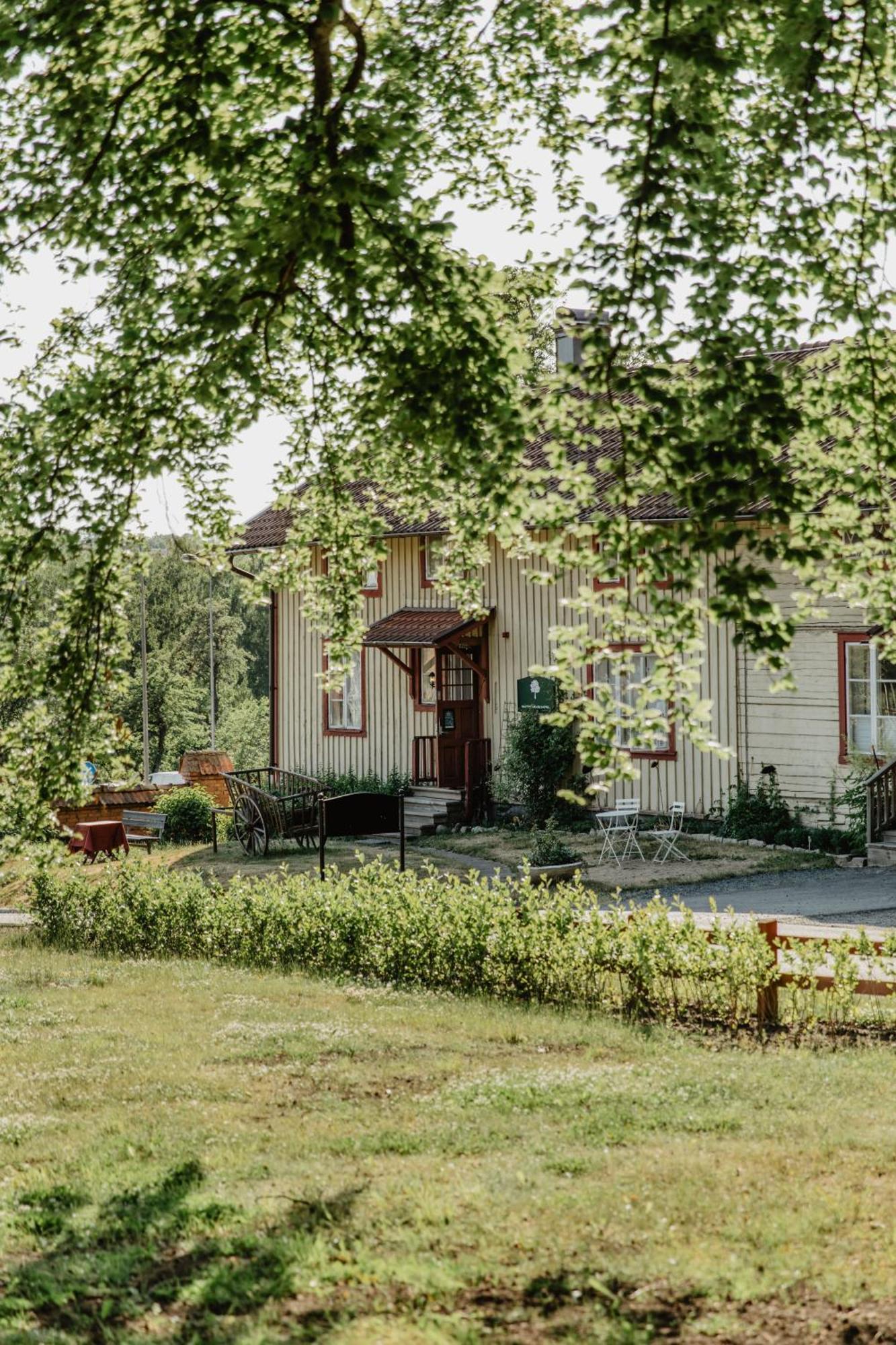 Slottsparken Motel Хускварна Экстерьер фото